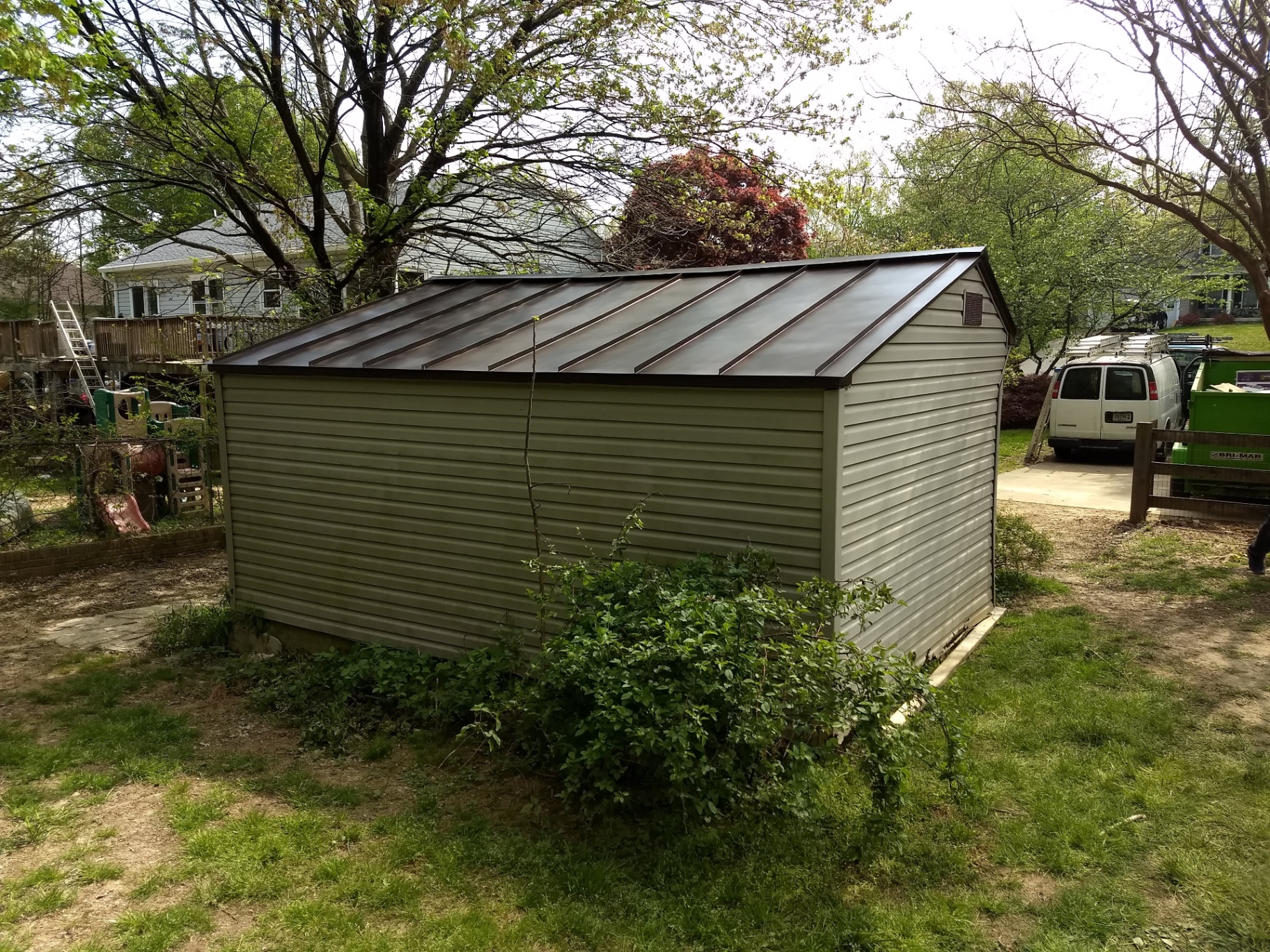 Standing-seam metal roof on an outbuilding
