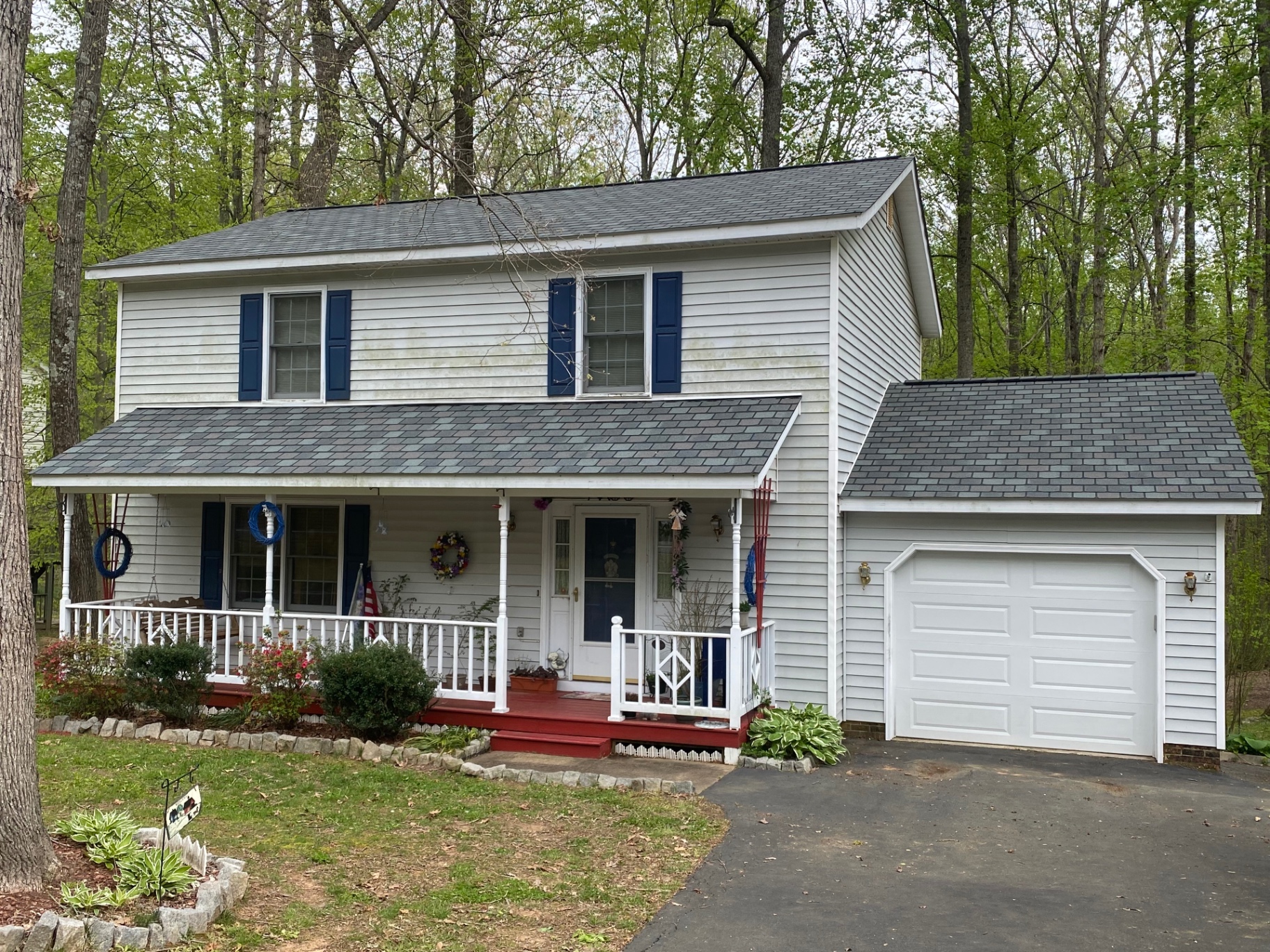 Two-story colonial with a new slate-look architectural shingle roof